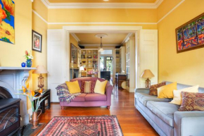 Stunning Victorian Home with Balconies, City Views